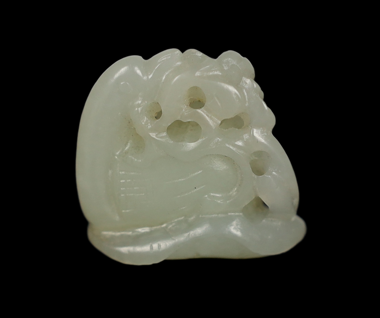A Chinese small white jade carving of a stylised duck, late Qing dynasty